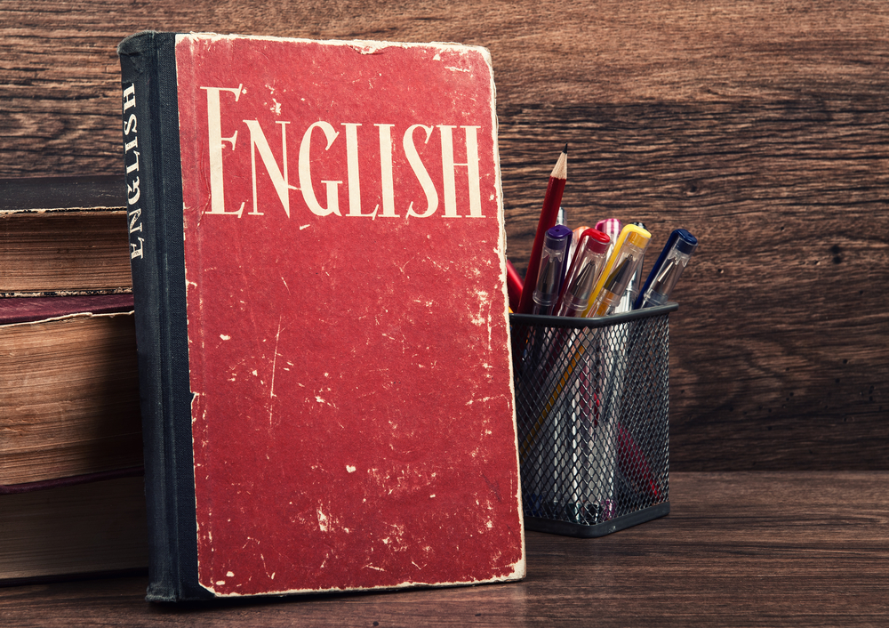 learning english concept. book on a wooden background